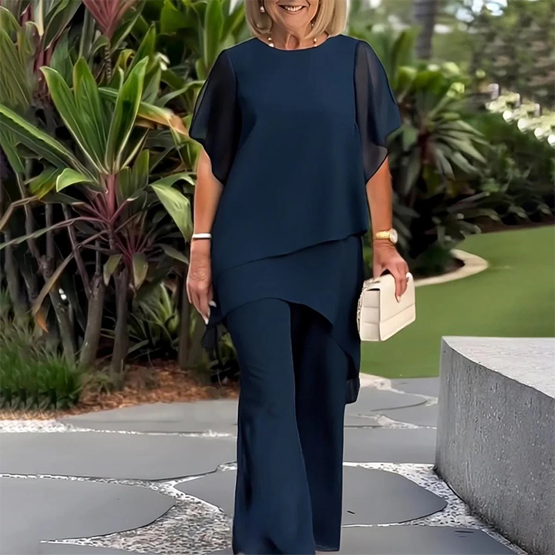Theresa | Elegant tvådelat set för damer med asymmetrisk topp och vida byxor