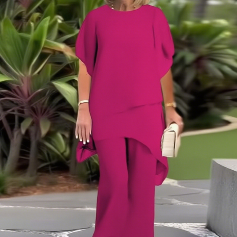 Theresa | Elegant tvådelat set för damer med asymmetrisk topp och vida byxor