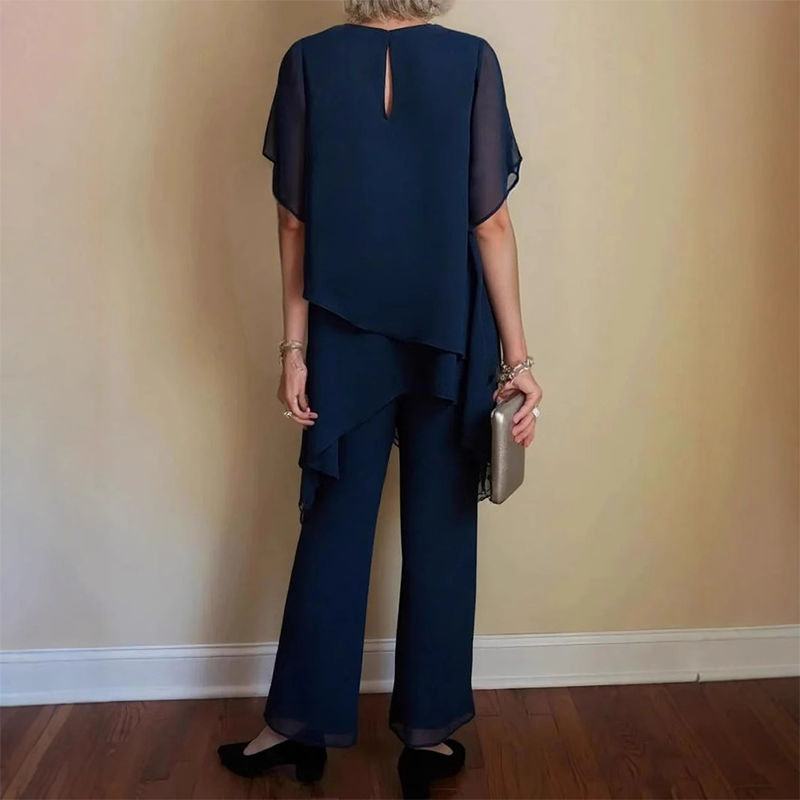 Theresa | Elegant tvådelat set för damer med asymmetrisk topp och vida byxor